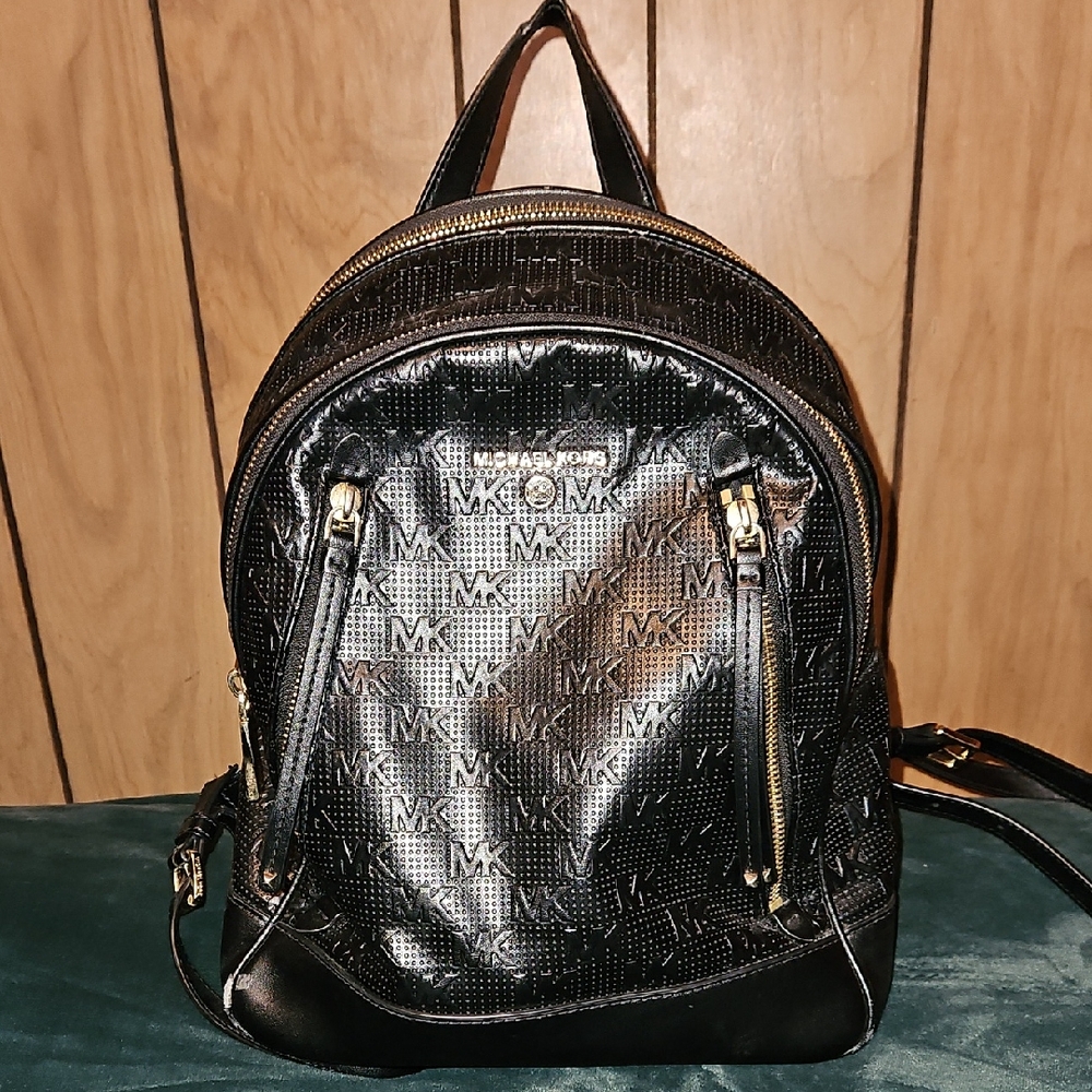 Michael Kors Shiny Black Backpack with Gold Details